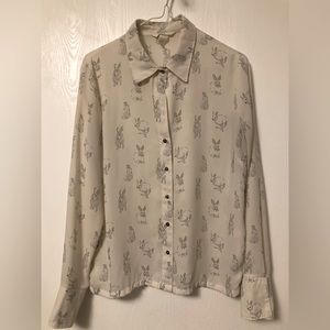 H&M white long sleeve blouse with rabbit print.